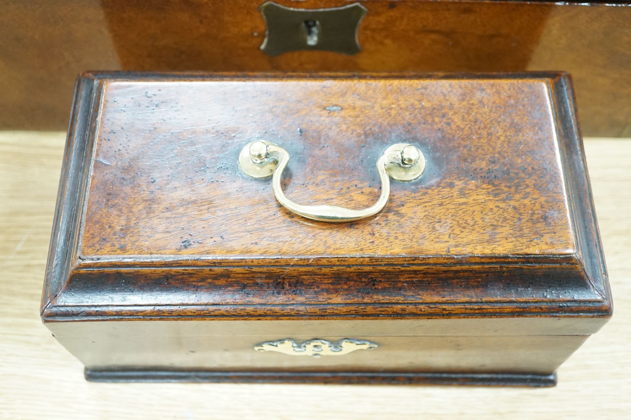 A Victorian mahogany writing slope and Chippendale-period mahogany tea caddy, Writing slope 50 cms wide.